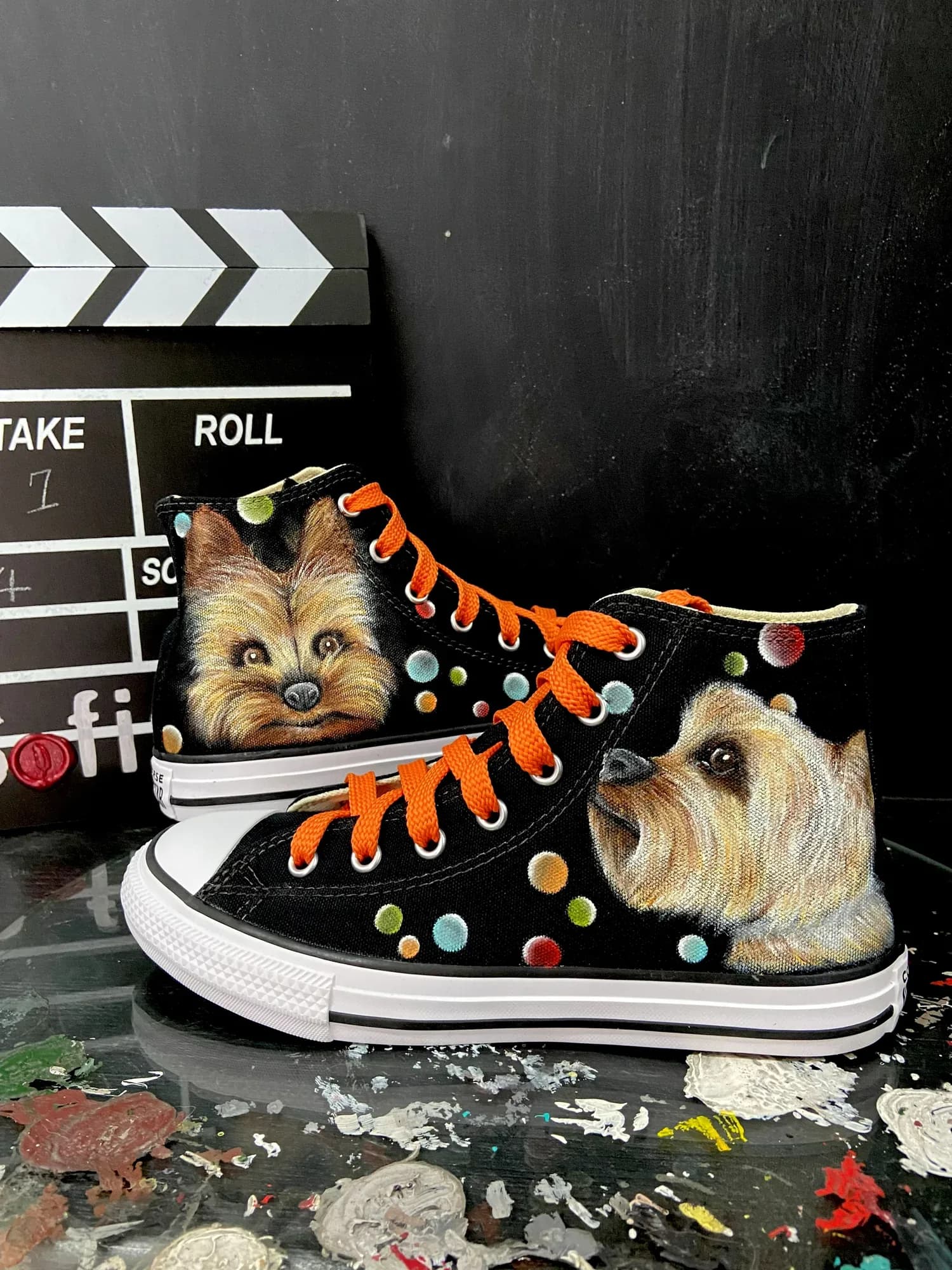 Black high-tops with Yorkshire terriers and orange laces