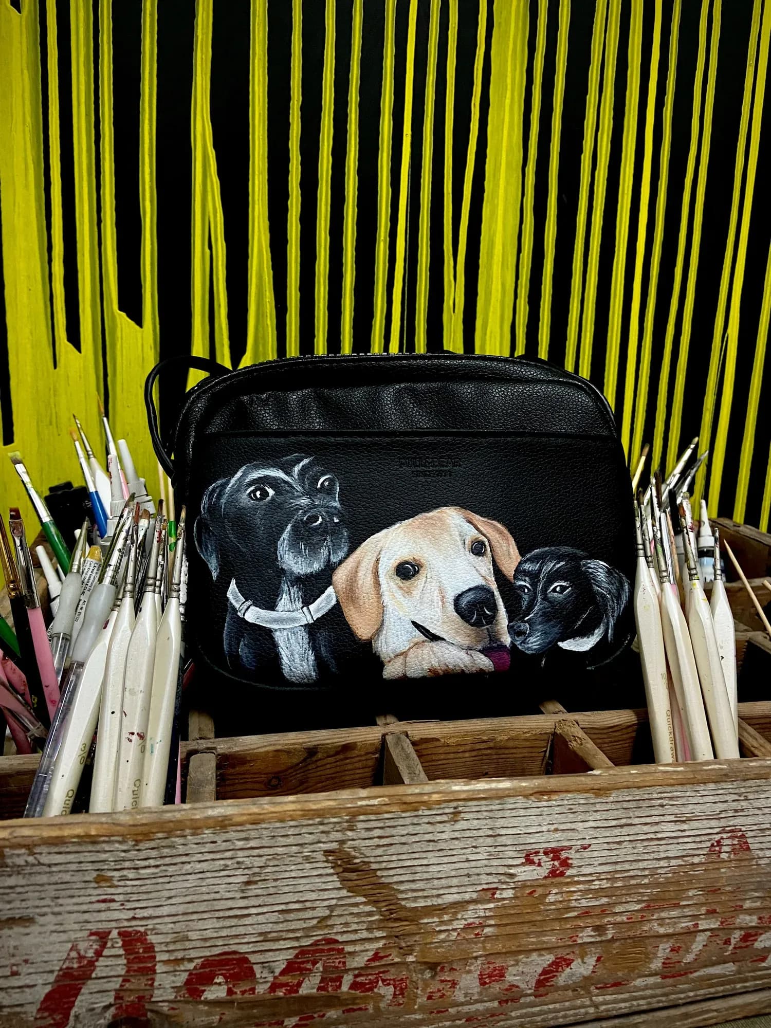 Black shoulder bag hand-painted with three dogs