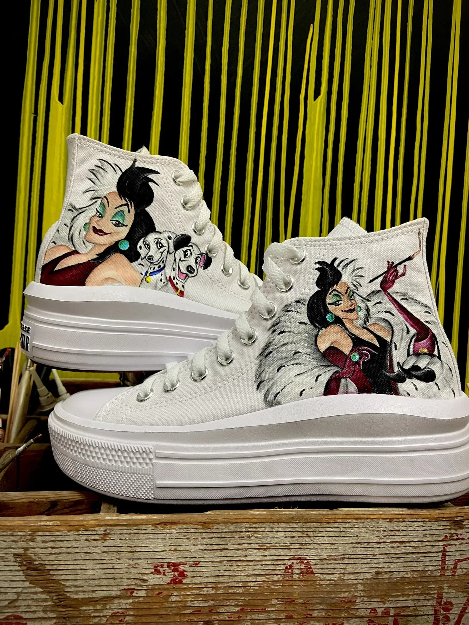 White platform high-tops hand-painted with Cruella de Vil