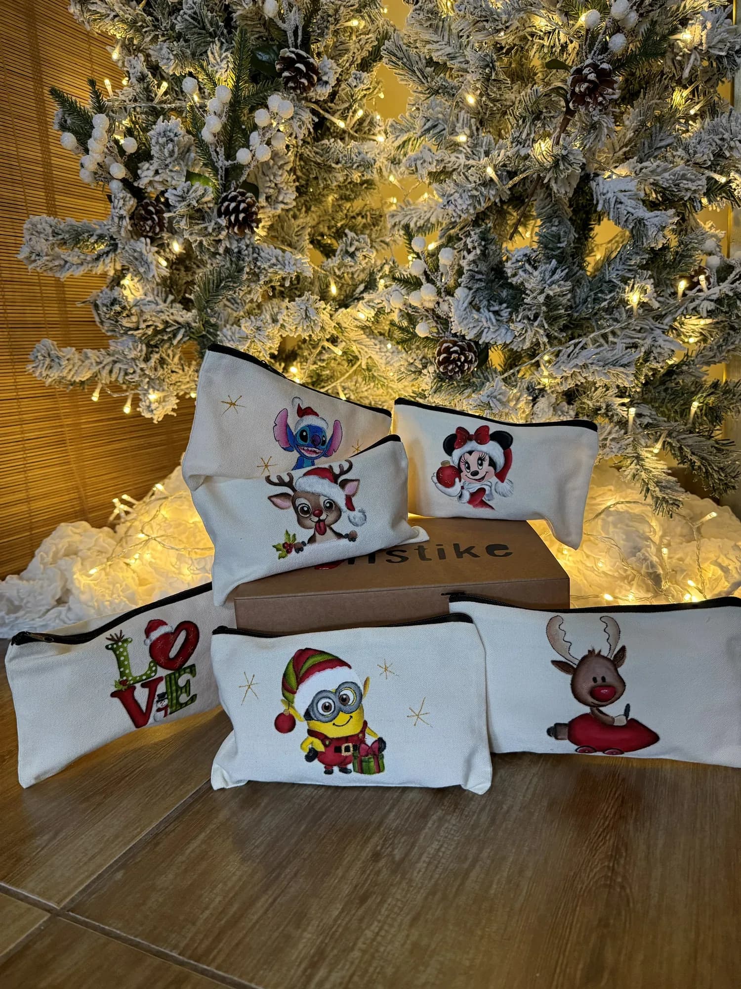 Fabric pouches hand-painted with Christmas characters