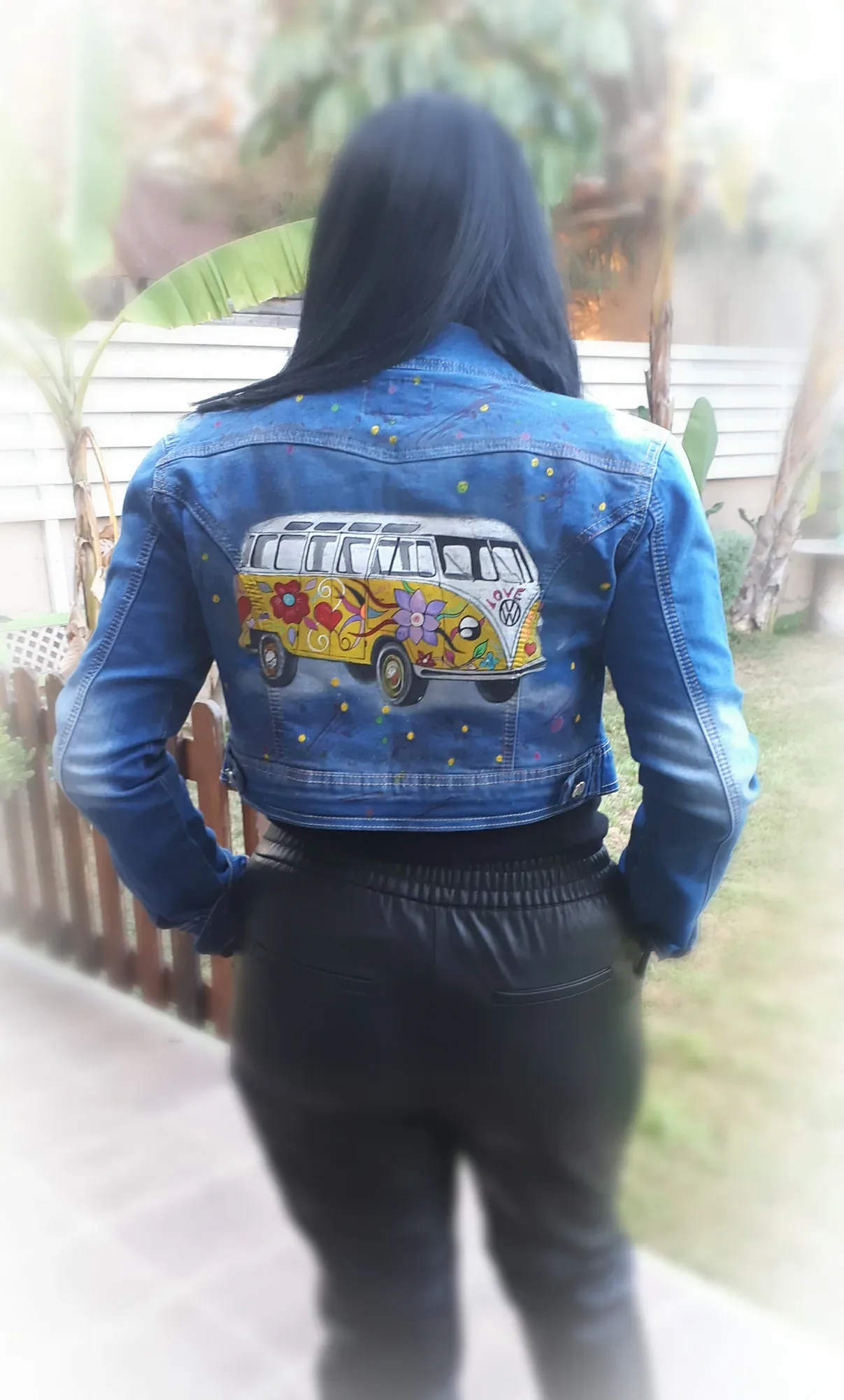 Denim jacket hand-painted on the back with a colourful camper van