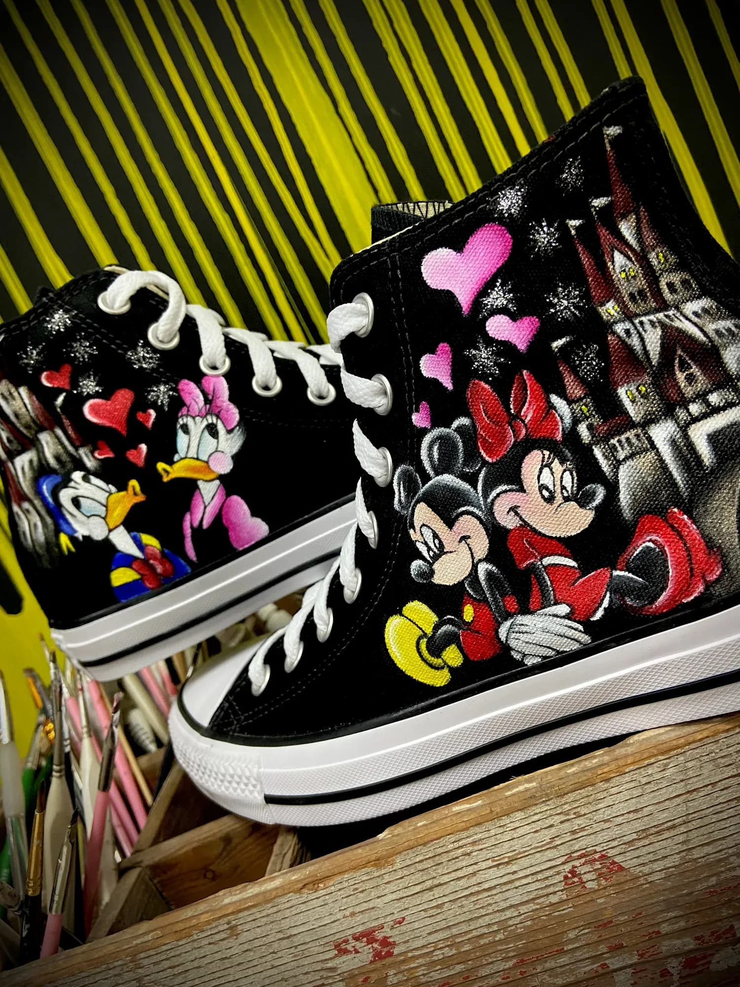 Black high-tops hand-painted with Minnie, Mickey and their friends