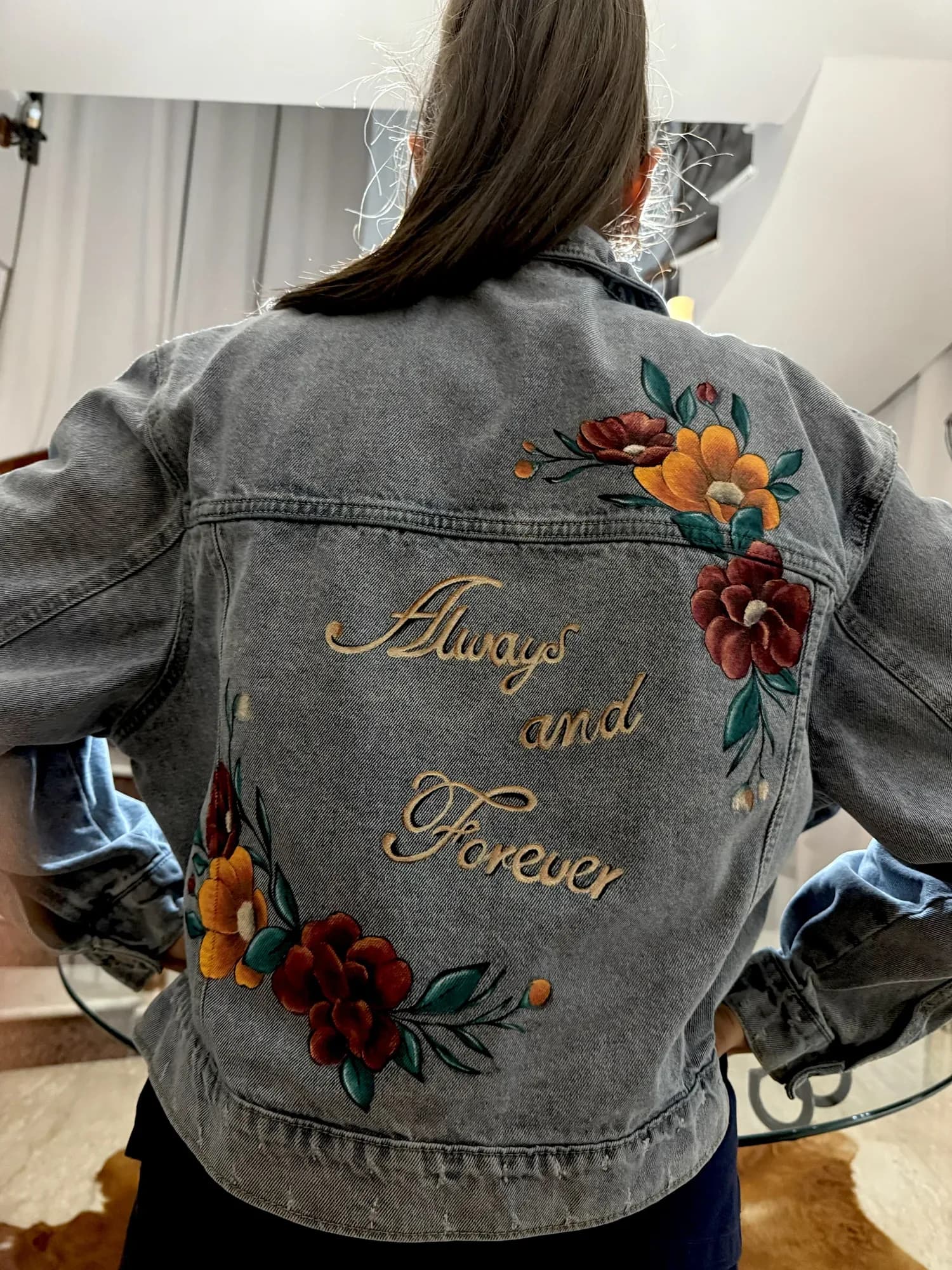 Grey denim jacket hand-painted with flowers and 'Always and Forever'