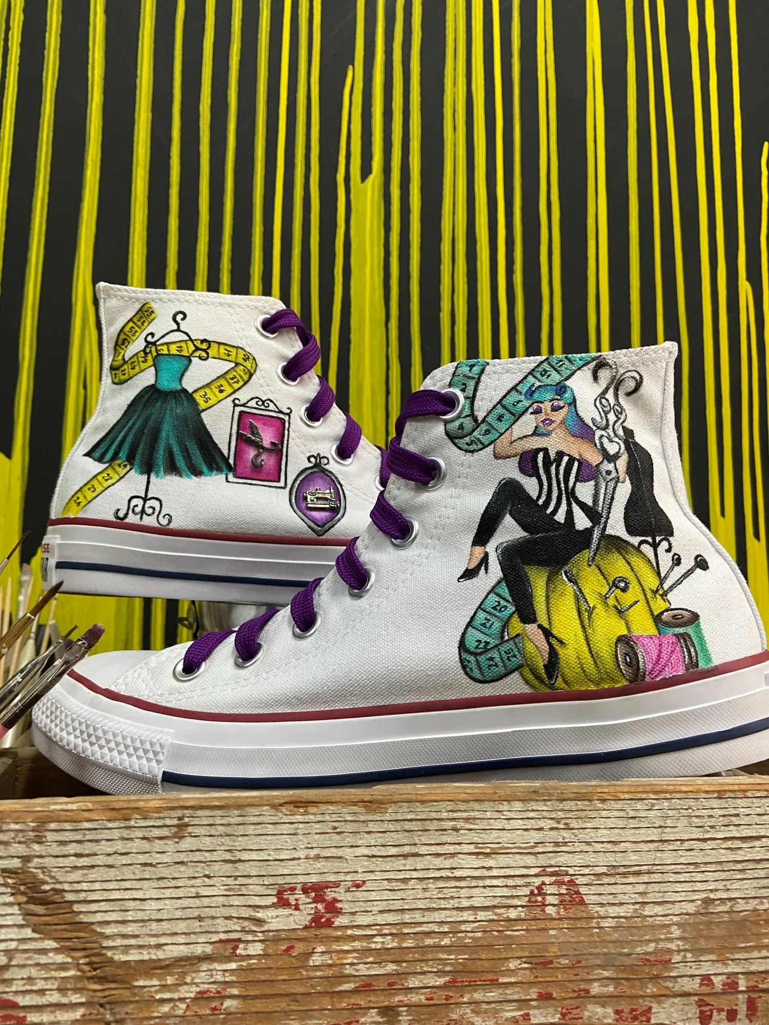 White high-top hand-painted with fashion designs and purple laces