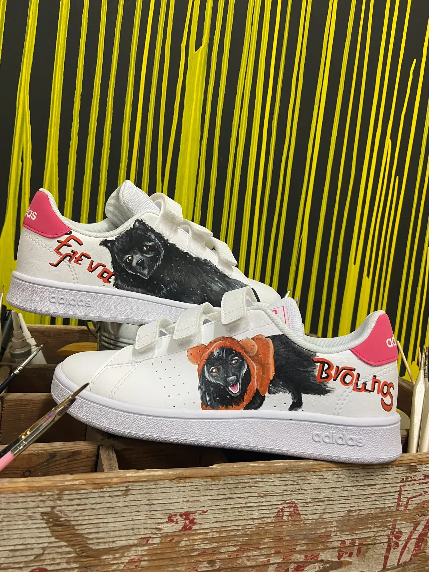 White sneakers hand-painted with dogs and their names